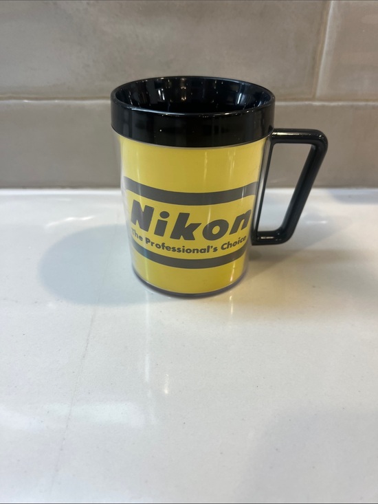 Vintage 70's Nikon thermal mug Camera-related